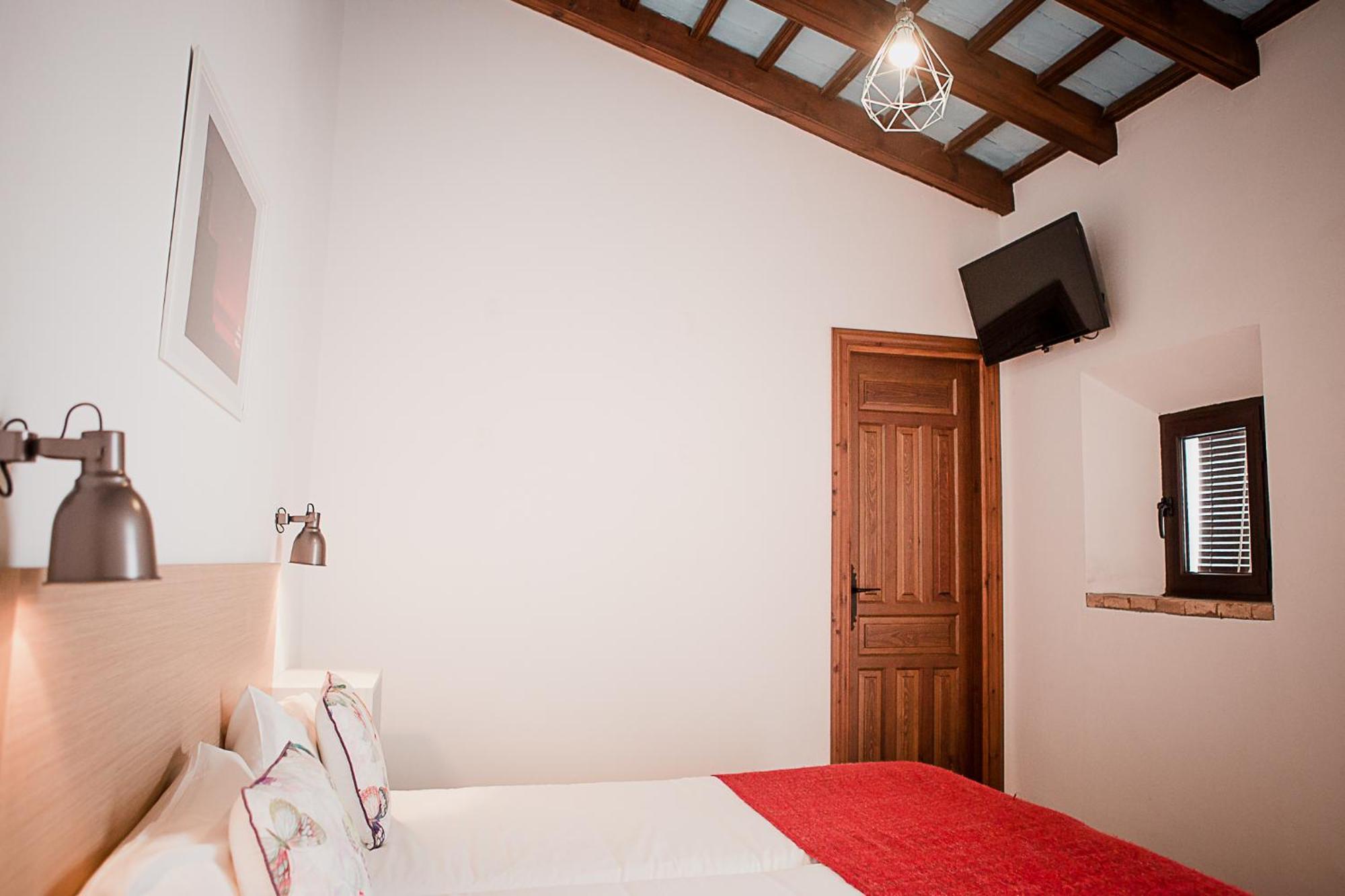 Hostal Cafe Frenteabastos การ์โมนา ภายนอก รูปภาพ